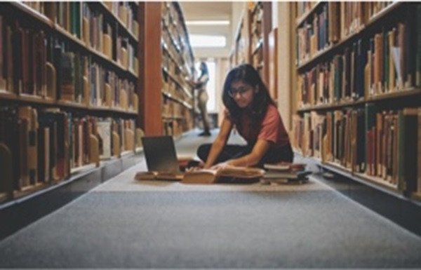 student in a library