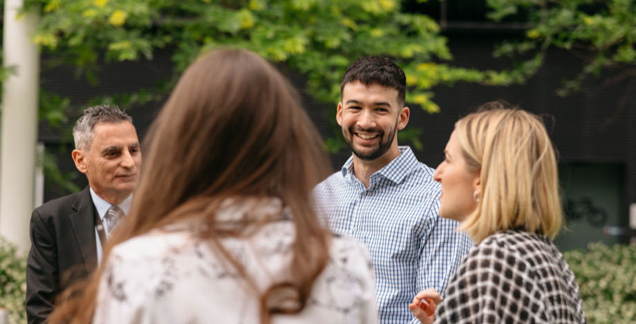 Group of students in front of trees