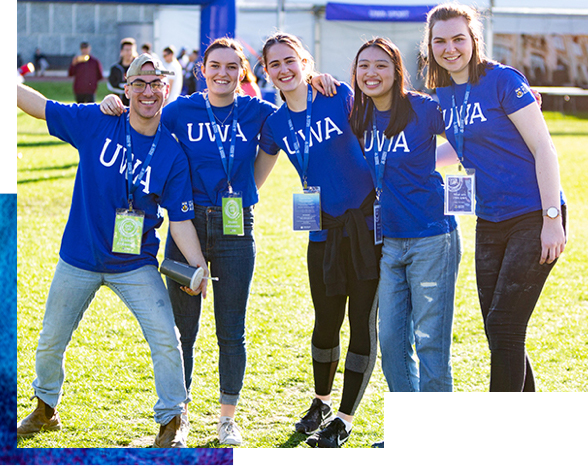 Group of students standing on grass