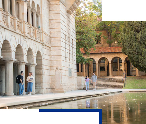 Image of four students walking through campus